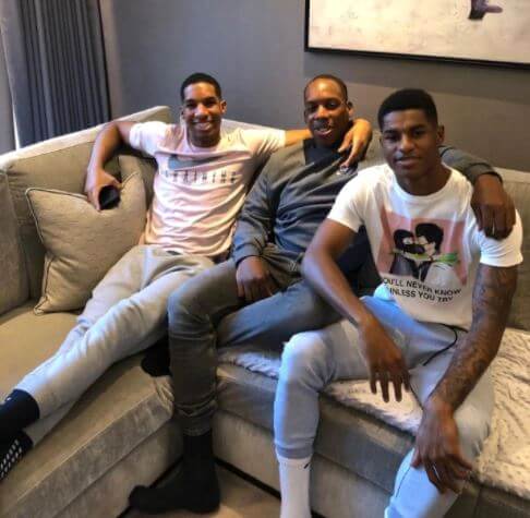 Robert Rashford's sons, Dwaine, Dane, and Marcus Rashford.